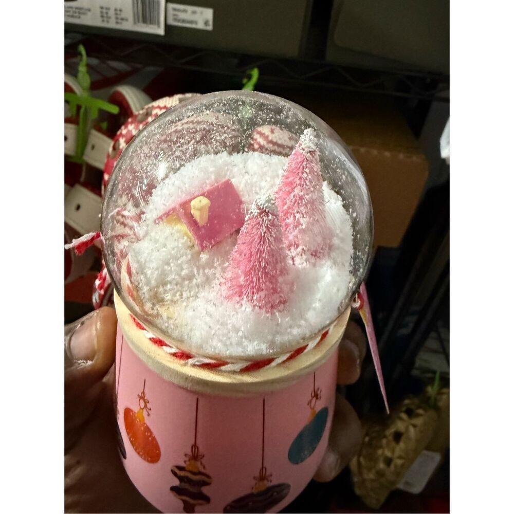 The 2023 Huntington Home Snow Globe Candle in Bergamot & Mahogany. - Picture 3 of 4
